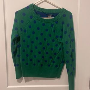 Green and blue polka dotted sweater